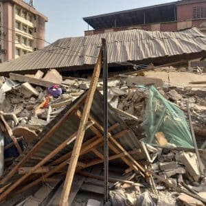 Trapped After Collapse: Woman Stuck, 12-Year-Old Rescued from Lagos Building Rubble