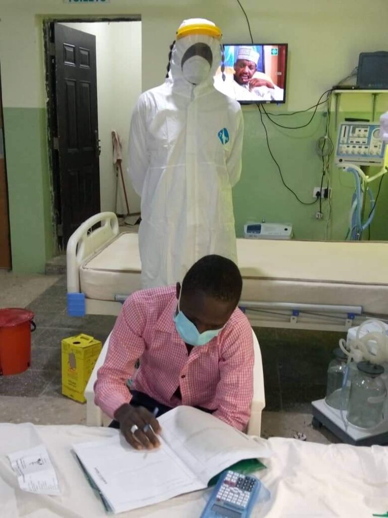 See Photo Of COVID-19 Patient Writing WAEC In Isolation Centre